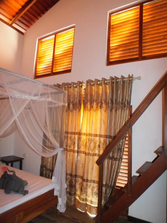 Letto o letti in una camera di Abraham Beach House