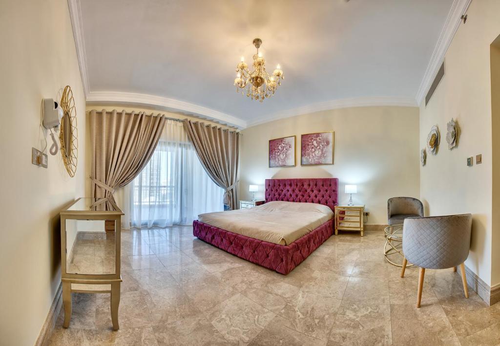 Postel nebo postele na pokoji v ubytování South & North Residence Palm Jumeirah