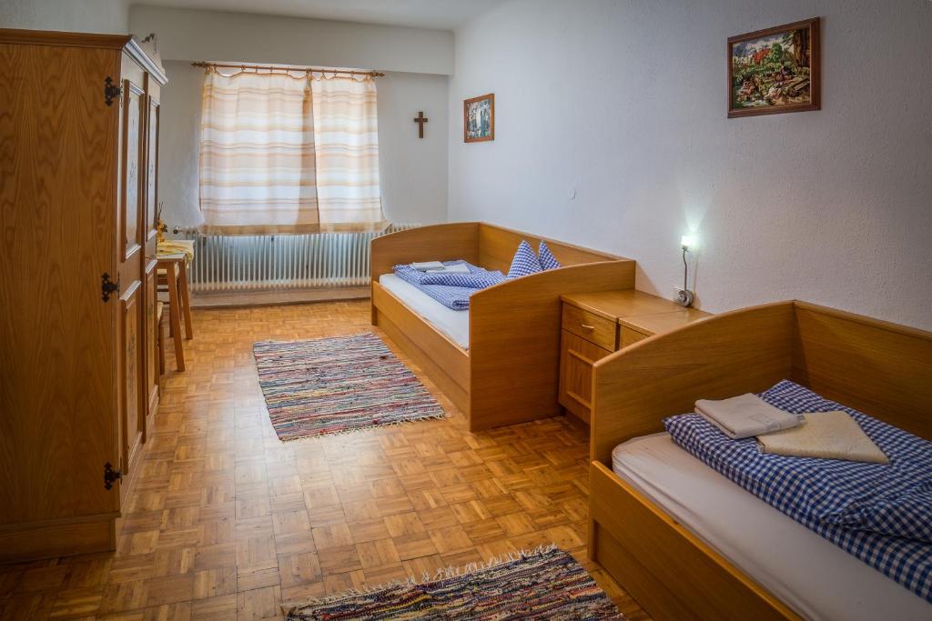 Postel nebo postele na pokoji v ubytování Familienhotel Hochrieß