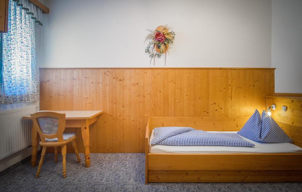 Postel nebo postele na pokoji v ubytování Familienhotel Hochrieß