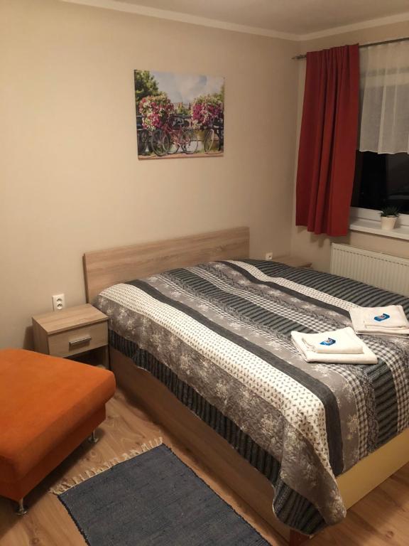 
Posteľ alebo postele v izbe v ubytovaní Beška
