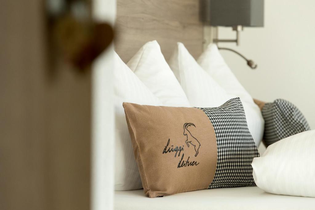 Postel nebo postele na pokoji v ubytování Haus Garni Luggi Leitner