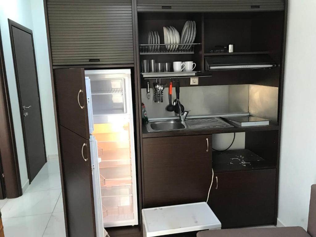 Kuchyňa alebo kuchynka v ubytovaní Metamorfosis Apartments