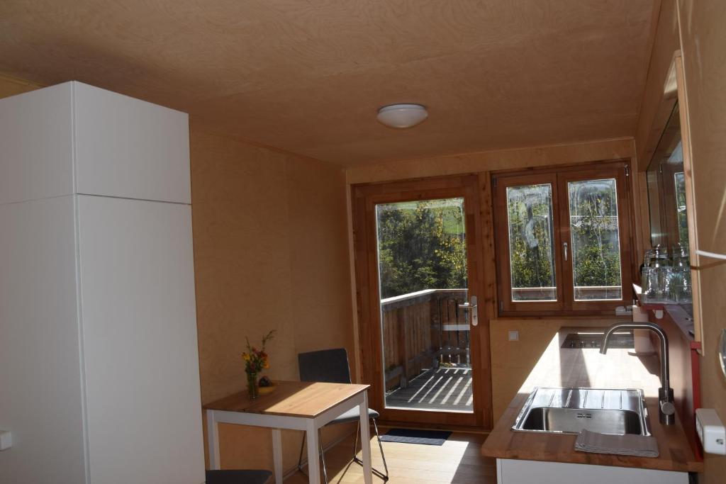 Een keuken of kitchenette bij Tiny Häuschen