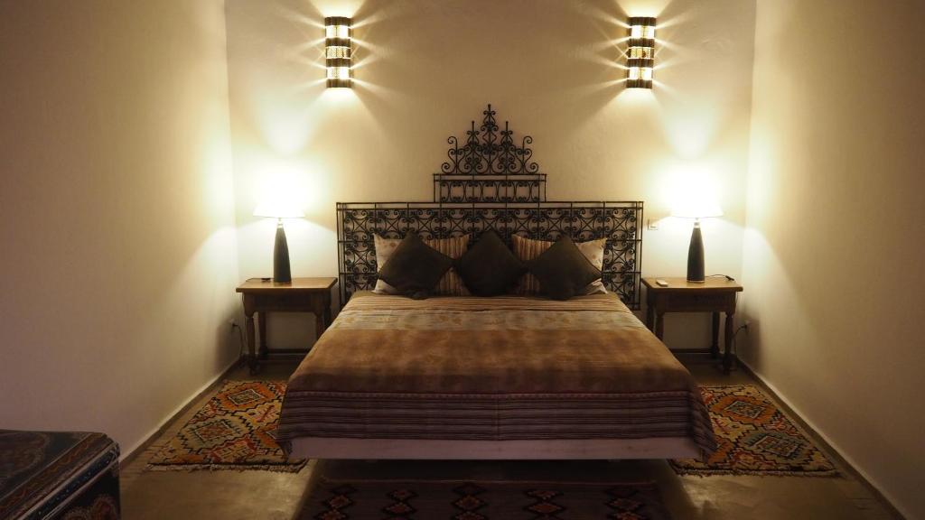 Postel nebo postele na pokoji v ubytování Riad Aventurine