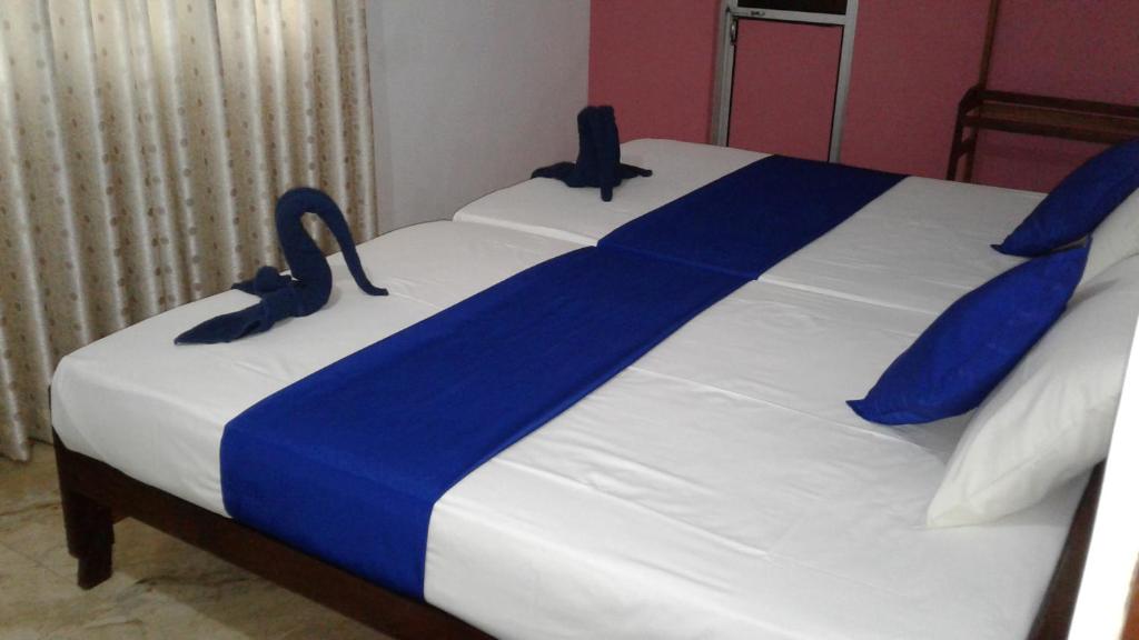 Postel nebo postele na pokoji v ubytování SA Village