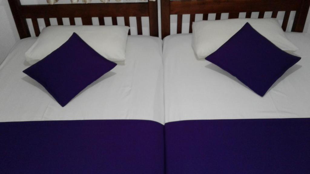 Postel nebo postele na pokoji v ubytování SA Village