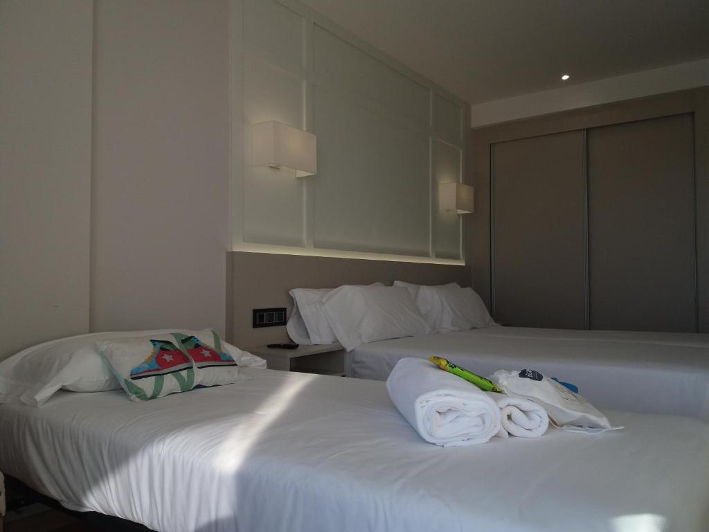 Cama o camas de una habitación en Oca Playa de Foz Hotel & Spa