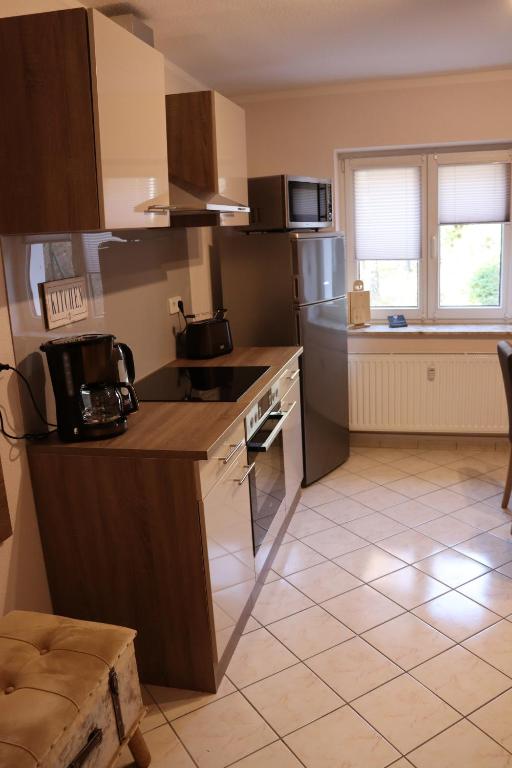 Kuchyň nebo kuchyňský kout v ubytování Ferienwohnungen an der Bosel