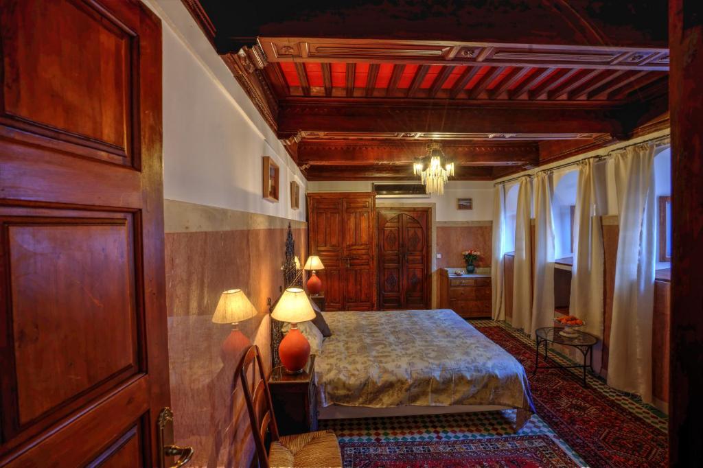 Postel nebo postele na pokoji v ubytování Riad Aventurine