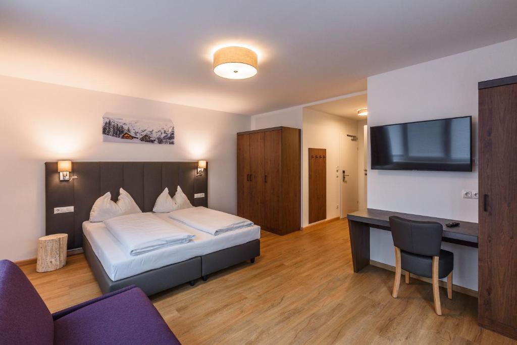 Postel nebo postele na pokoji v ubytování Haus Hubertus