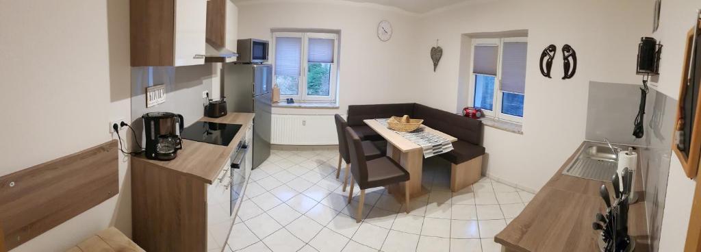 Kuchyň nebo kuchyňský kout v ubytování Ferienwohnungen an der Bosel