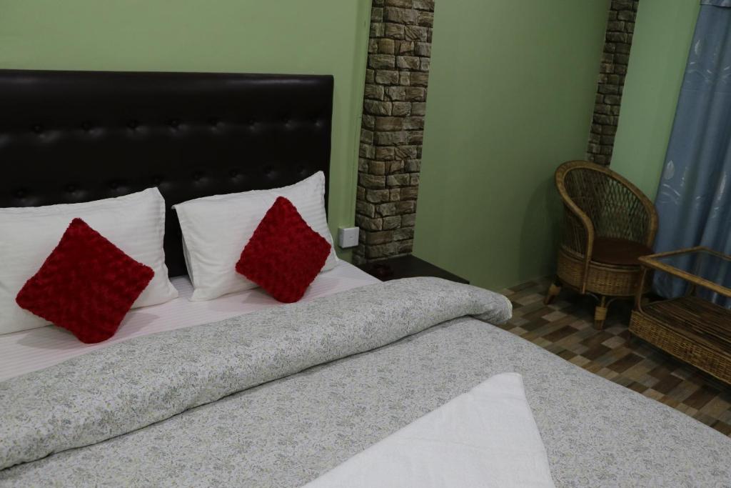 Postel nebo postele na pokoji v ubytování Hotel Happy Home