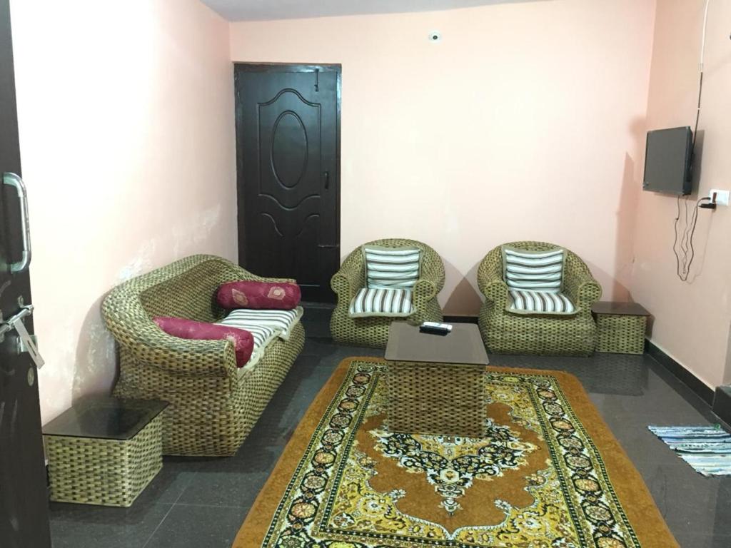 Posezení v ubytování Coorg West End Home Stay