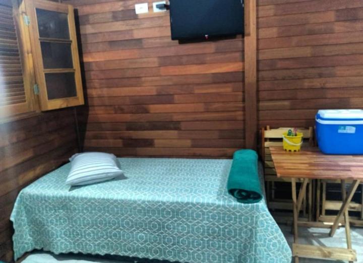Postel nebo postele na pokoji v ubytování Residencial Chalés Riviera