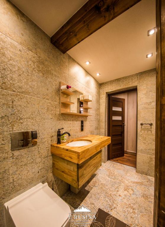 Kúpeľňa v ubytovaní Apartamenty u Rusina