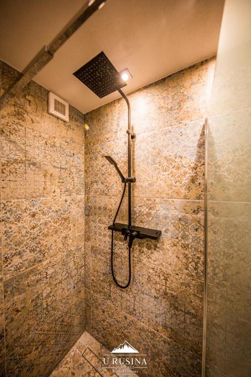 Kúpeľňa v ubytovaní Apartamenty u Rusina