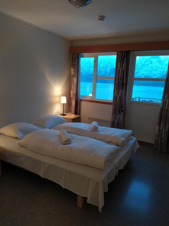 Postel nebo postele na pokoji v ubytování Winjum Apartments Aurland Stegastein