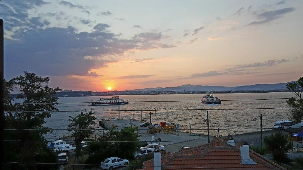 a view of boats in the water at sunset at Dardanelles1915 in Çanakkale