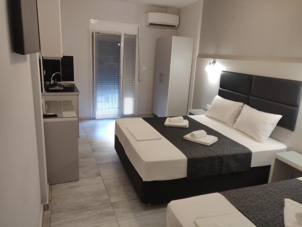 TV a/nebo společenská místnost v ubytování Alexion Apartments