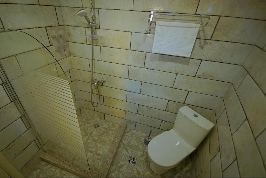 Koupelna v ubytování Hotel Cordata