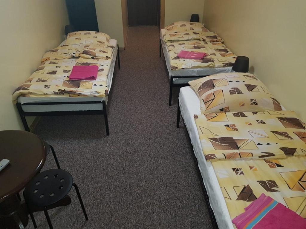 Posteľ alebo postele v izbe v ubytovaní Pokoje Relaks 2