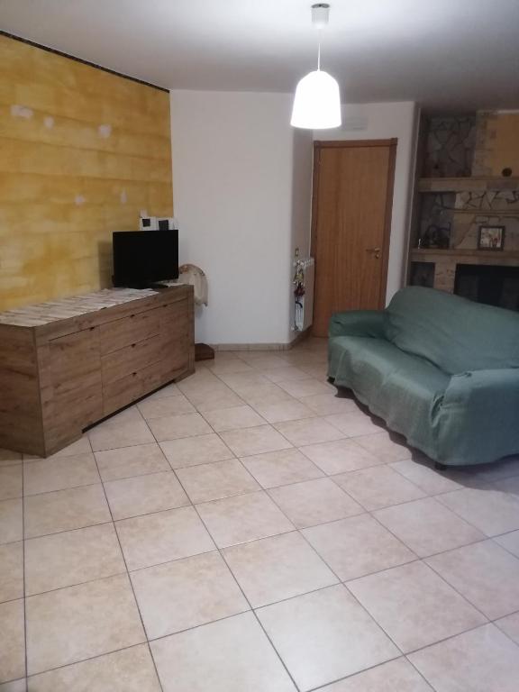 Telewizja i/lub zestaw kina domowego w obiekcie Villa Aurora Per Vacanze