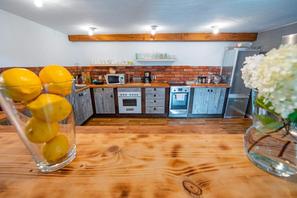 Kuchyňa alebo kuchynka v ubytovaní Agroturystyka "Dobre czasy"