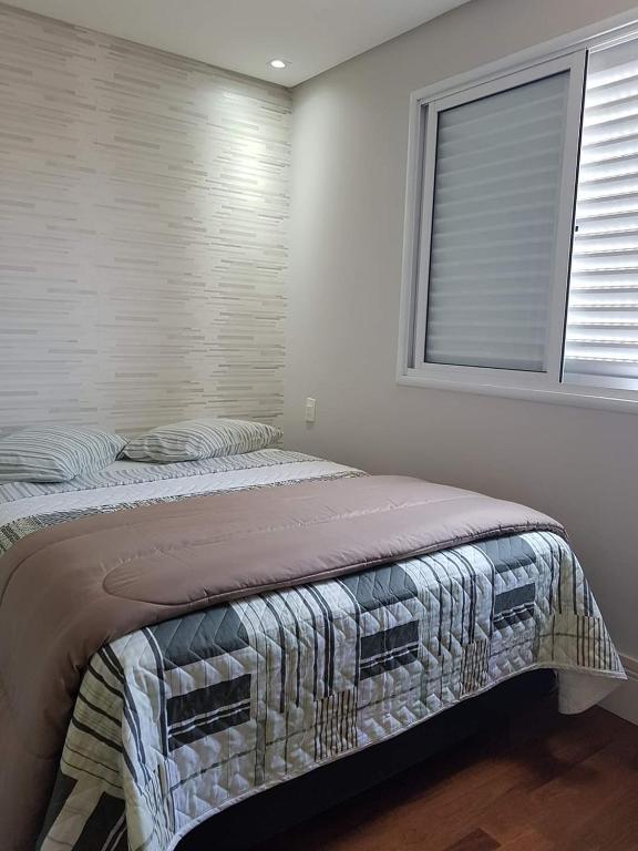  Quarto/suíte em residência famíliar