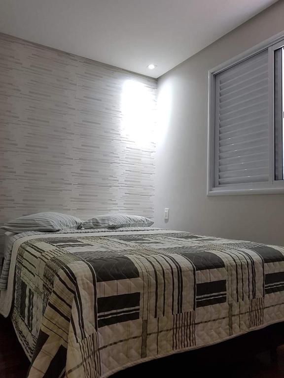  Quarto/suíte em residência famíliar
