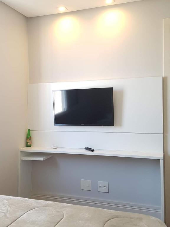  Quarto/suíte em residência famíliar