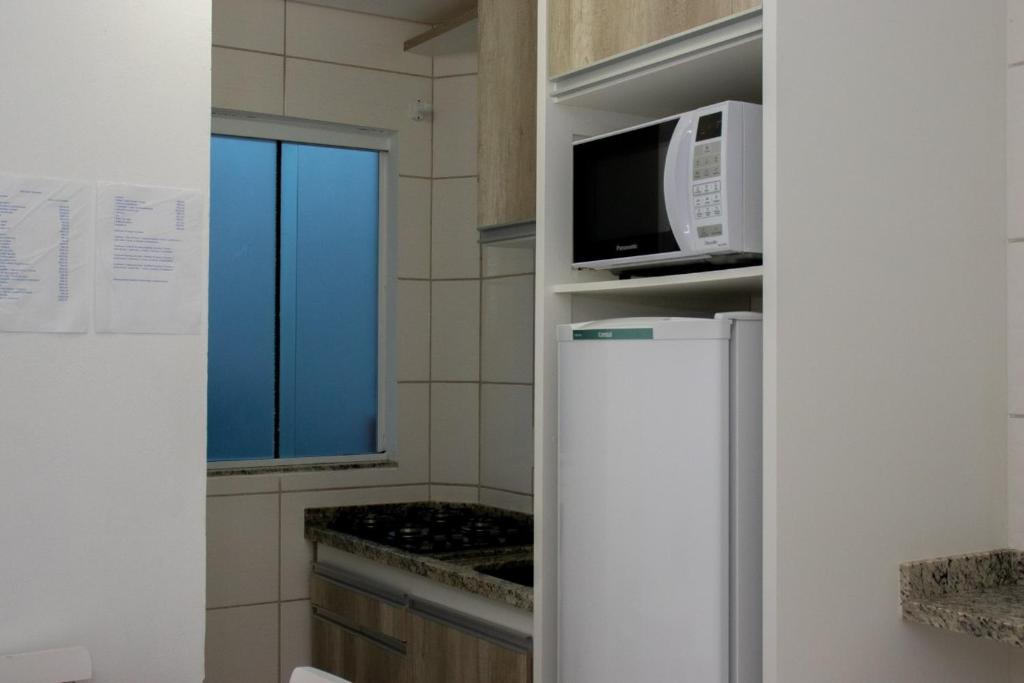 Kuchyň nebo kuchyňský kout v ubytování Residencial Neto
