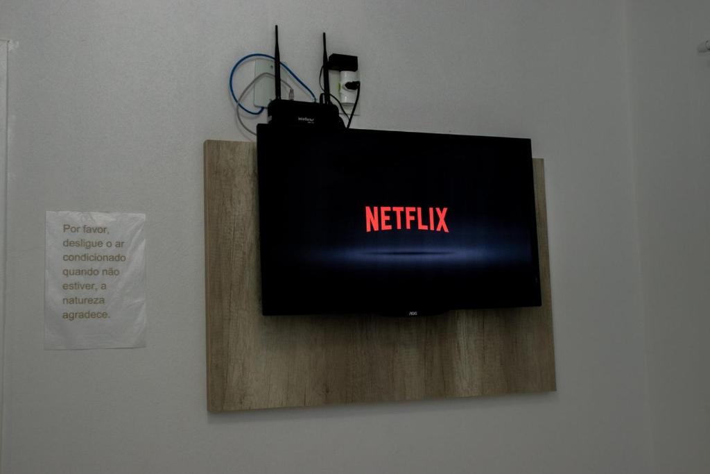 TV a/nebo společenská místnost v ubytování Residencial Neto