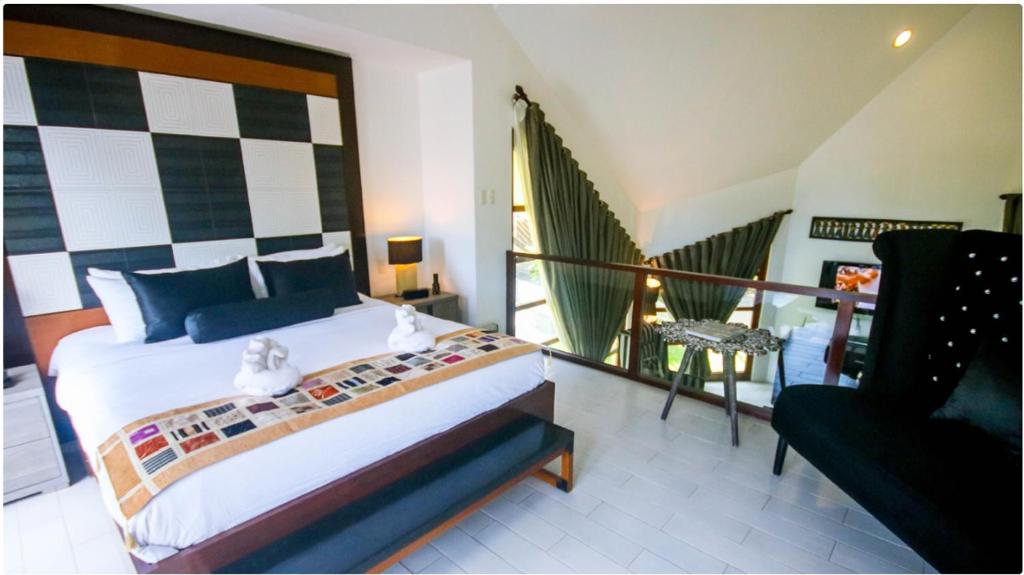 Postel nebo postele na pokoji v ubytování Segara Villas