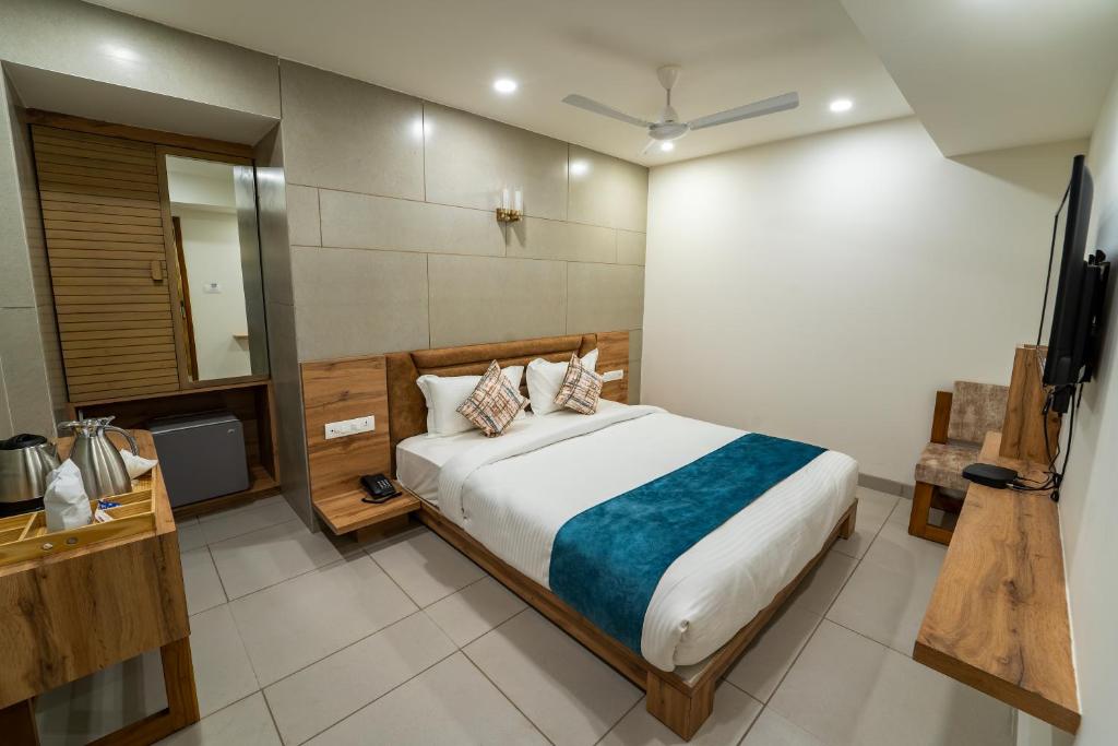 Postel nebo postele na pokoji v ubytování Hotel Pleasant Lake