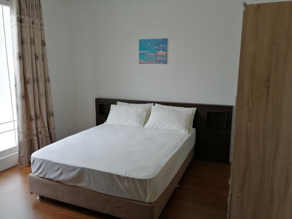 Postel nebo postele na pokoji v ubytování Fali Guest House