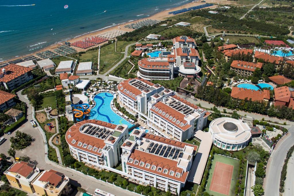 an aerial view of a resort near the beach at Alba Queen Hotel in Side