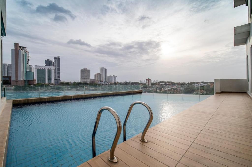 a swimming pool on the roof of a building at Signature Private Pool 14pax KSL by CCS Home in Johor Bahru