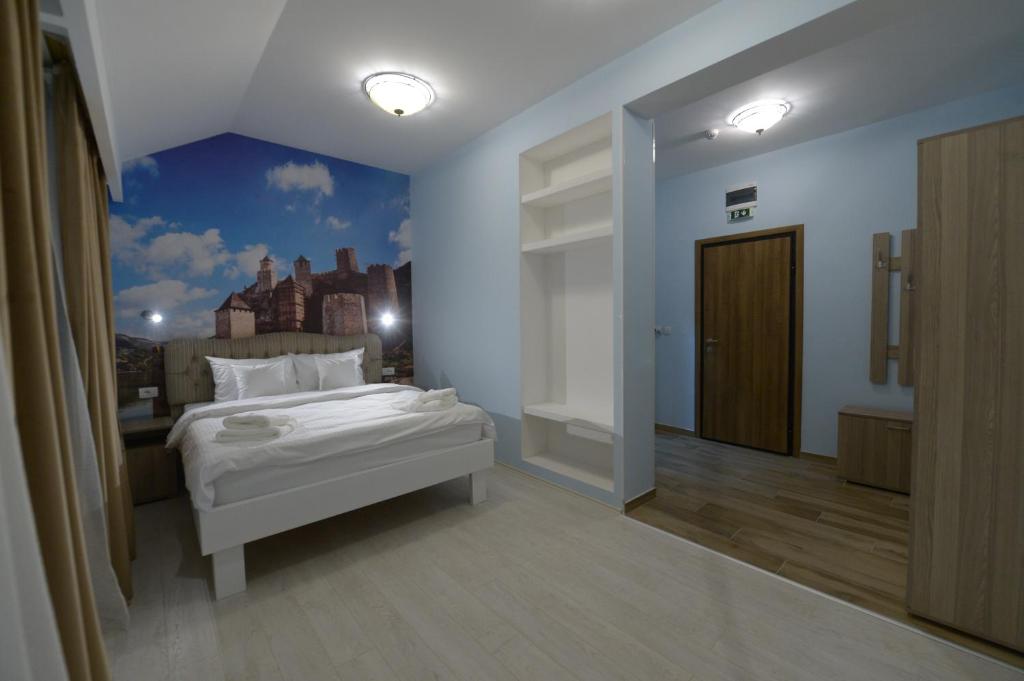 Postel nebo postele na pokoji v ubytování Srpsko Andrejevo Selo