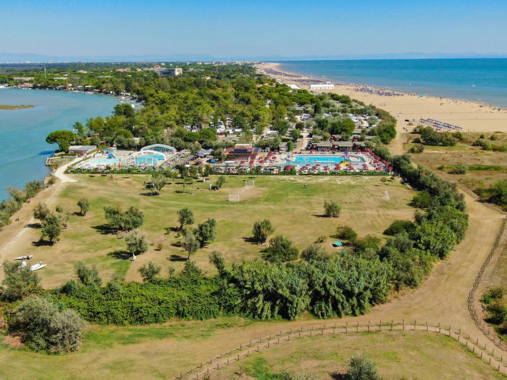 an aerial view of a park next to the beach at Camping Village Capalonga in Bibione
