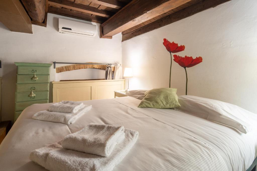Posteľ alebo postele v izbe v ubytovaní Lambertesca Loft by Mmega