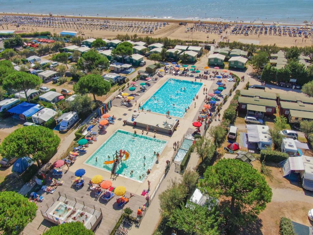 an overhead view of a pool at a beach at Camping Lido in Bibione