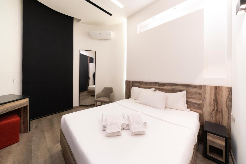 Postel nebo postele na pokoji v ubytování Loft 29 Residence