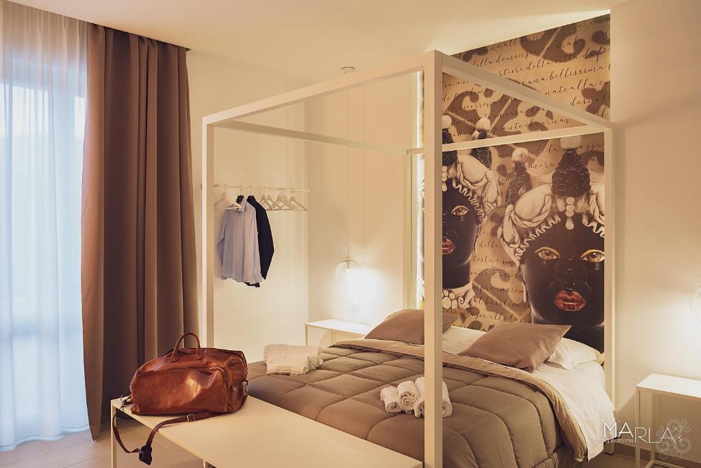 Posteľ alebo postele v izbe v ubytovaní Marla's boutique rooms