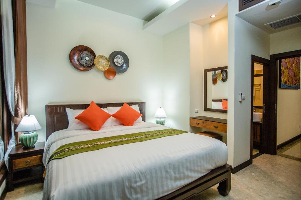 Postel nebo postele na pokoji v ubytování 2H RESORT KOH SAMUI
