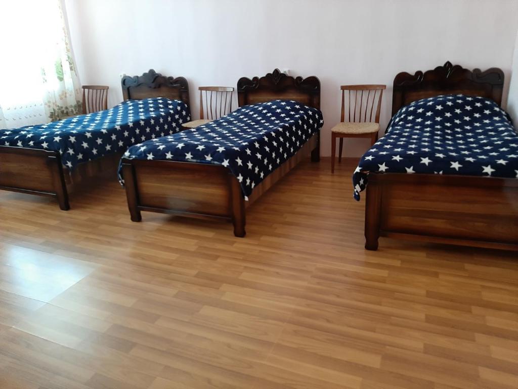 Postel nebo postele na pokoji v ubytování Shorena's Homestay