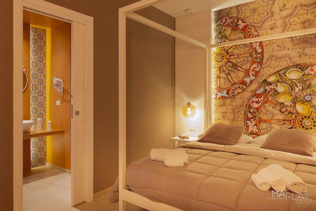Posteľ alebo postele v izbe v ubytovaní Marla's boutique rooms