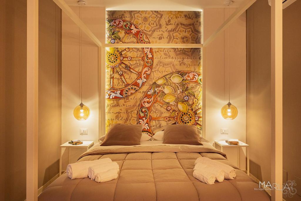Posteľ alebo postele v izbe v ubytovaní Marla's boutique rooms