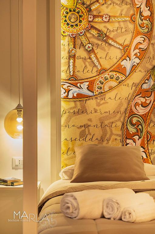 Posteľ alebo postele v izbe v ubytovaní Marla's boutique rooms
