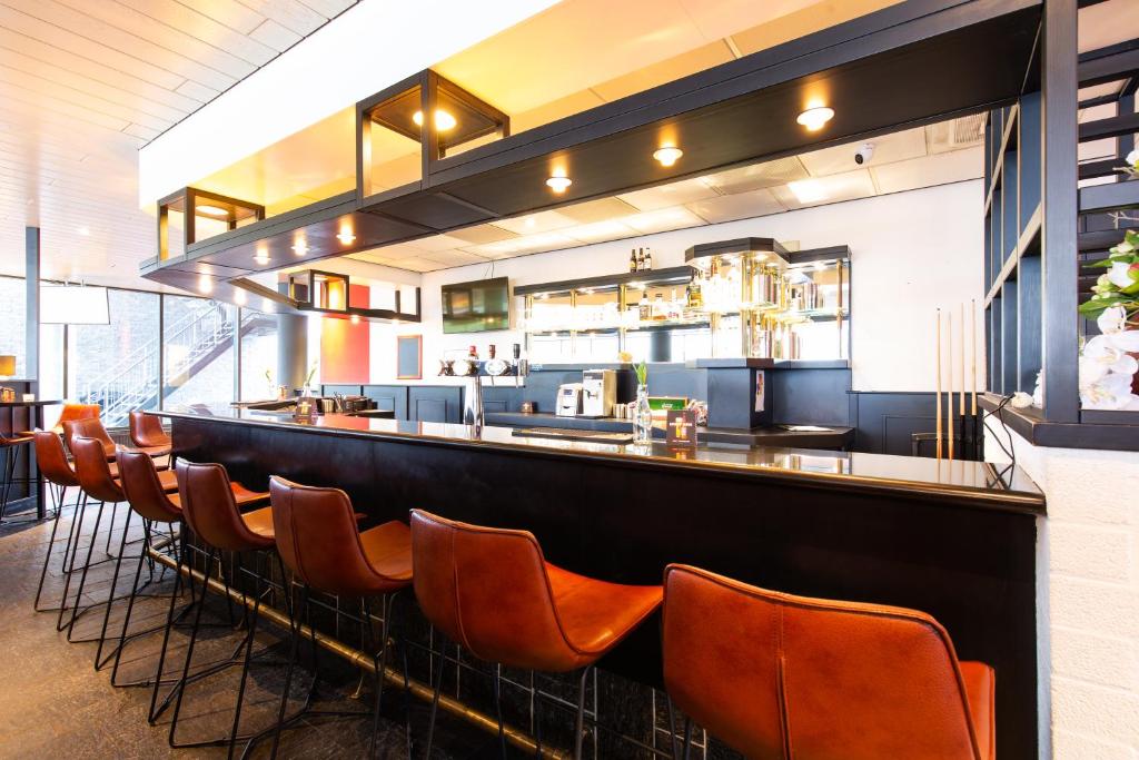 Lounge nebo bar v ubytování Bastion Hotel Almere